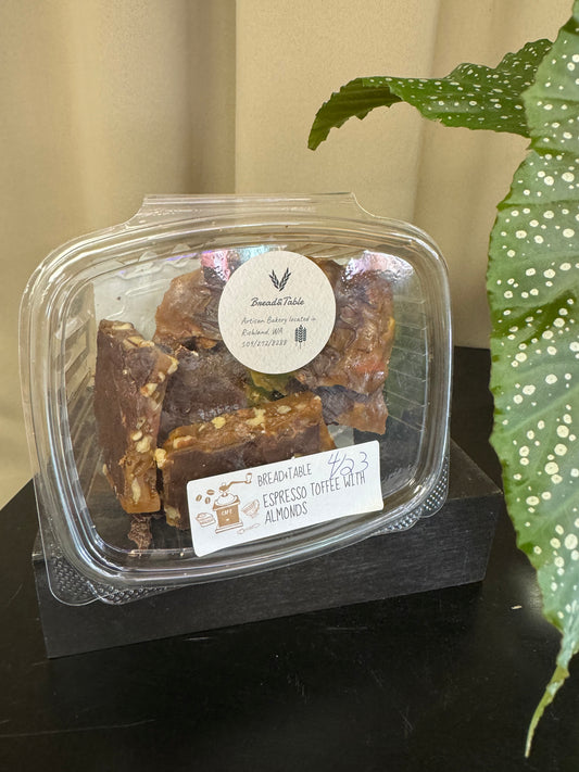 Handmade espresso toffee with almonds by bread & table